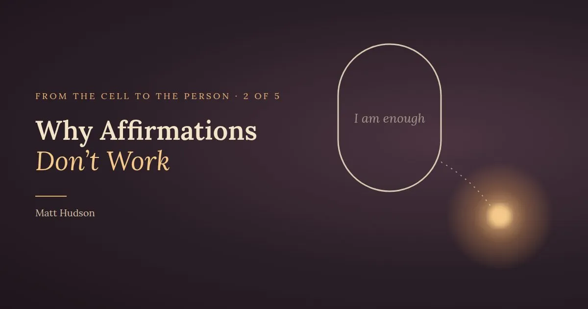 An arched mirror reading 'I am enough' with a soft glow off to one side